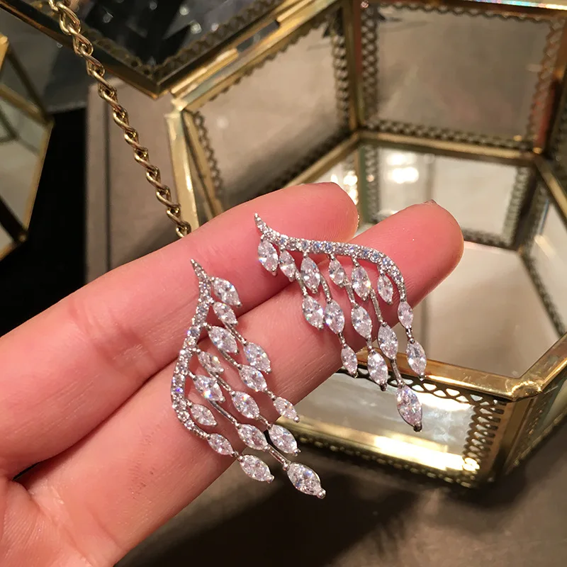 UMGODLY Luxury Brand Angel Wings Drop Earrings Full CZ Zircon Women Fashion Wedding Jewelry
UMGODLY Luxury Brand Angel Wings Drop Earrings Full CZ Zircon Women Fashion Wedding Jewelry