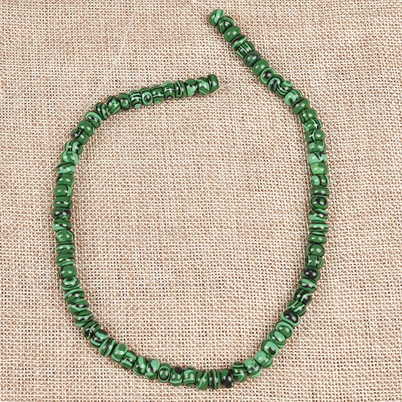 Nearly spherical Semiprecious complex Black Stria 8*4 MM Complex Synthesis Malachite Loose beads make bracelet or Necklace
Nearly spherical Semiprecious complex Black Stria 8*4 MM Complex Synthesis Malachite Loose beads make bracelet or Necklace
