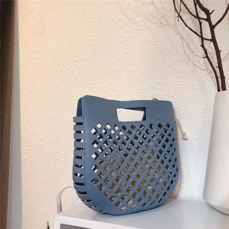 2019 Fashion Saddle bag women Hollow out handbag solid color PU leather tote bag Summer seaside beach bag with larger capacity
2019 Fashion Saddle bag women Hollow out handbag solid color PU leather tote bag Summer seaside beach bag with larger capacity