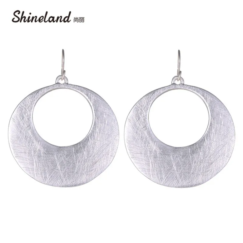 Shineland 2019 Brincos New Unique Design Gold Silver Color Hollow Circle Tactile American Brand Fashion Drop Earrings For women
Shineland 2019 Brincos New Unique Design Gold Silver Color Hollow Circle Tactile American Brand Fashion Drop Earrings For women