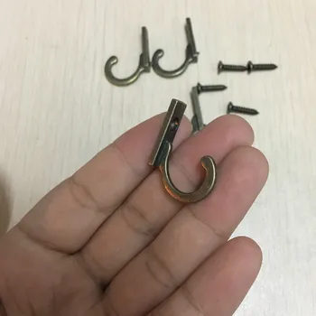 Key Mini Hangers,Antique Style Metal Bronze Hook Decorative Furniture Wood Board Mounted Robe Hooks,28*22mm,4Pcs 
Key Mini Hangers,Antique Style Metal Bronze Hook Decorative Furniture Wood Board Mounted Robe Hooks,28*22mm,4Pcs