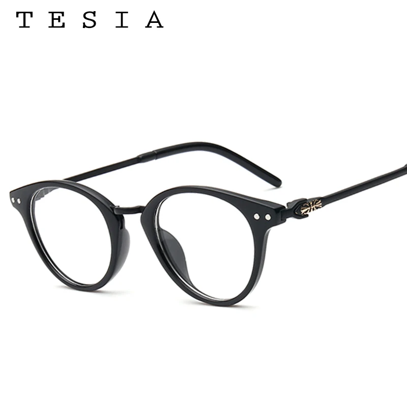 TESIA Vintage Round Glasses Frame For Women Men Unisex Rivets Clear Eyeglasses Cross Optical Frames Lunette de vue femme
TESIA Vintage Round Glasses Frame For Women Men Unisex Rivets Clear Eyeglasses Cross Optical Frames Lunette de vue femme