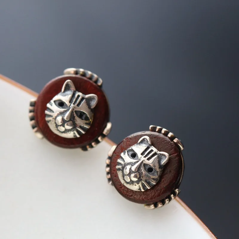 silver wholesale women retro 925 sterling silver earrings with natural red sandalwood Thai silver cat stud earrings
silver wholesale women retro 925 sterling silver earrings with natural red sandalwood Thai silver cat stud earrings