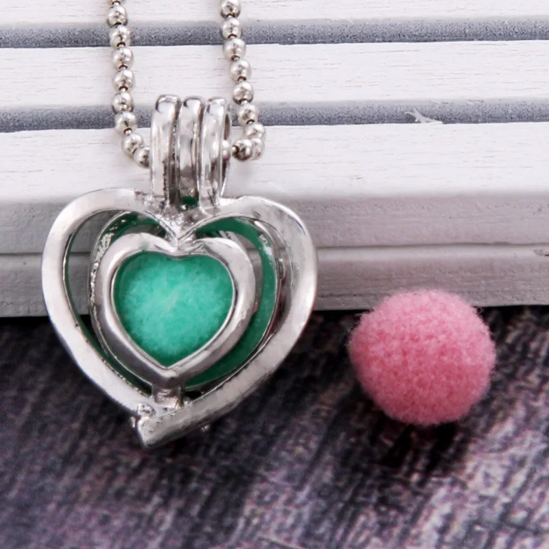 3 colors heart shape Aroma Diffuser Necklace Perfume Essential Oil Diffuser Aromatherapy Pendant Necklace Pearl cage Pendant
3 colors heart shape Aroma Diffuser Necklace Perfume Essential Oil Diffuser Aromatherapy Pendant Necklace Pearl cage Pendant