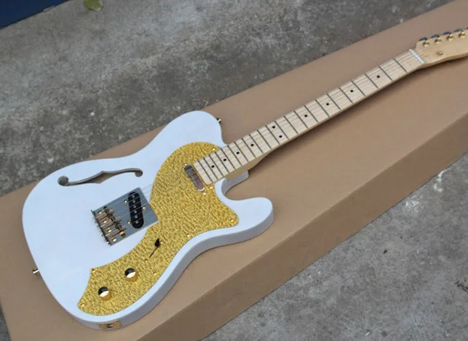 White Semi-hollow Electric Guitar with Golden Pickguard,Maple Fingerboard,Gold Hardwares,can be changed as you request
White Semi-hollow Electric Guitar with Golden Pickguard,Maple Fingerboard,Gold Hardwares,can be changed as you request