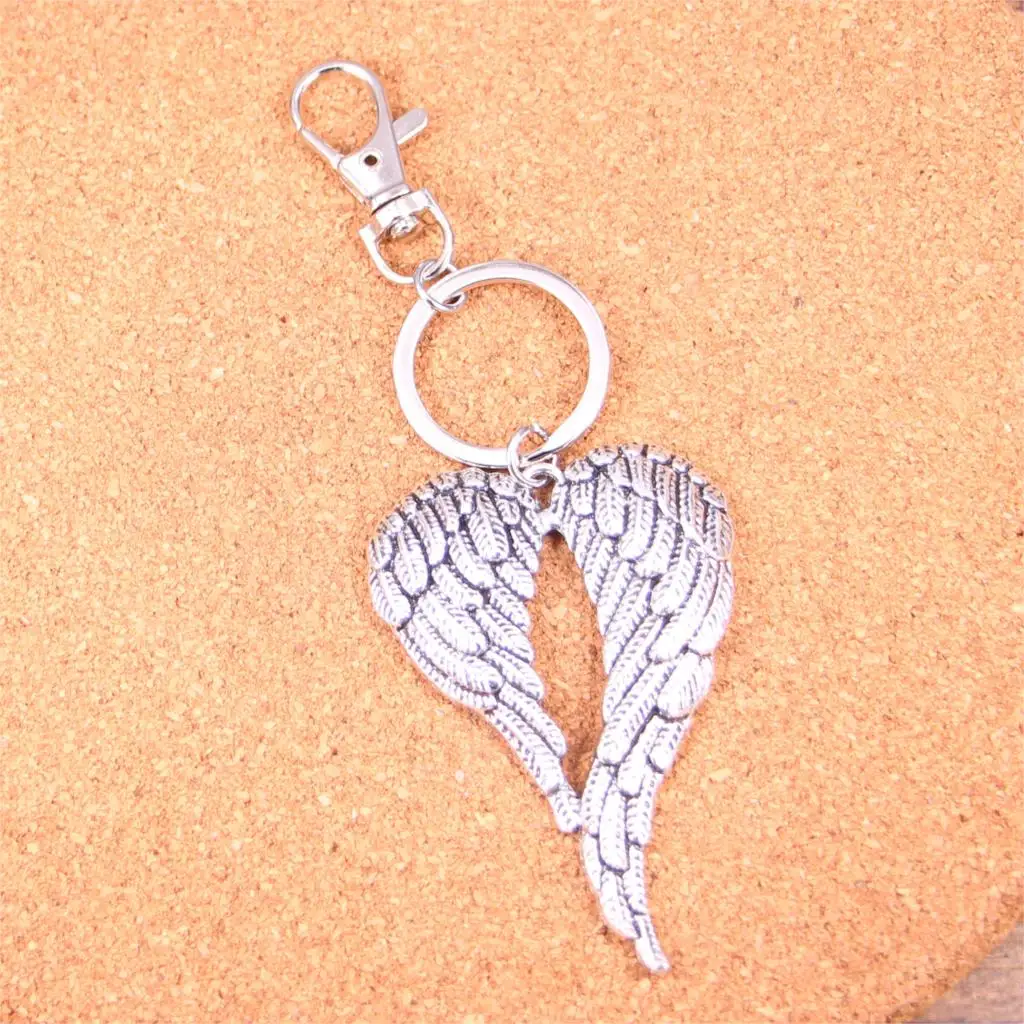New Angel Wings Keychain Silver Swivel Lobster Clasp Clips Handbag Car Charms Jewelry For Key Chain Trinket Jewelry Gift
New Angel Wings Keychain Silver Swivel Lobster Clasp Clips Handbag Car Charms Jewelry For Key Chain Trinket Jewelry Gift