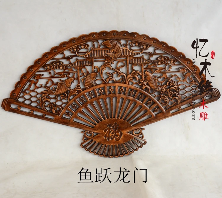 Dongyang camphor wood crafts carving pendant fan hanging antique wood Chinese style living room decoration
Dongyang camphor wood crafts carving pendant fan hanging antique wood Chinese style living room decoration