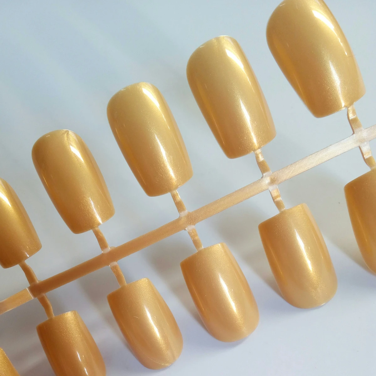 Fashion Acrylic Fake Nail Shiny Light Gold False Nails Long Acrylic Nails Tip DIY Nail Art For Lady Finger Manicure Tool 002L 
Fashion Acrylic Fake Nail Shiny Light Gold False Nails Long Acrylic Nails Tip DIY Nail Art For Lady Finger Manicure Tool 002L