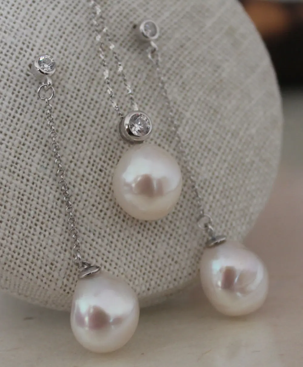 Hot selling free shipping***** 12-15mm Freshwater Pearl Studs with 925 silver pendant crystals
Hot selling free shipping***** 12-15mm Freshwater Pearl Studs with 925 silver pendant crystals