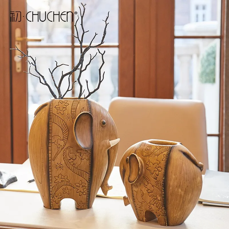 Creative Nordic living room, dining table, TV cabinet, elephant vase simulation flower arrangement, dried flower appliances, hom
Creative Nordic living room, dining table, TV cabinet, elephant vase simulation flower arrangement, dried flower appliances, hom