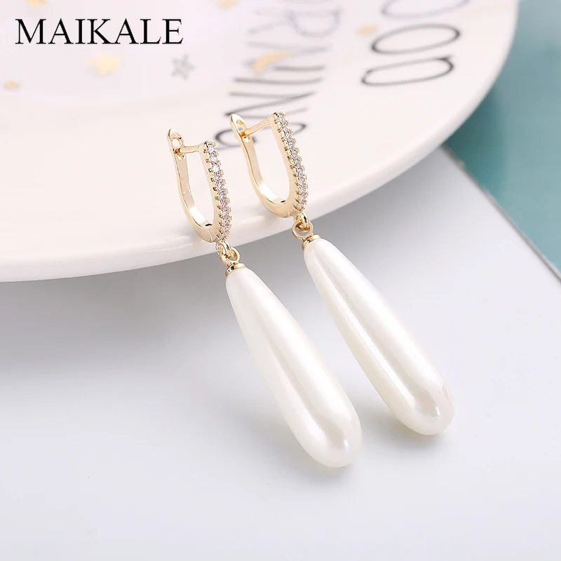 MAIKALE Simple Baroque Pearl Earrings Cubic Zirconia Gold Silver Long Pearls Drop Dangle Earrings for Women Fashion Jewelry Gift
MAIKALE Simple Baroque Pearl Earrings Cubic Zirconia Gold Silver Long Pearls Drop Dangle Earrings for Women Fashion Jewelry Gift