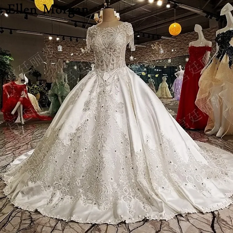 Sexy See Through Ball Gowns Wedding Dresses 2019 with Beading Stones Ivory Satin Elegant Princess Merry Custom Made for Bridal
Sexy See Through Ball Gowns Wedding Dresses 2019 with Beading Stones Ivory Satin Elegant Princess Merry Custom Made for Bridal