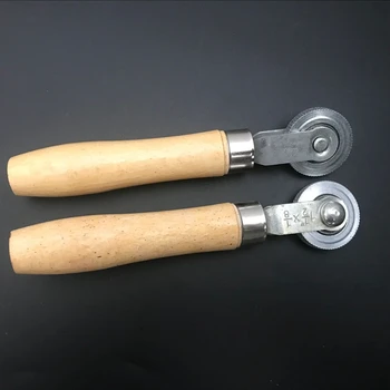 Pressure roller compaction roller pressure roller rolling cold film automotive tire repair car tire repair tool
Pressure roller compaction roller pressure roller rolling cold film automotive tire repair car tire repair tool