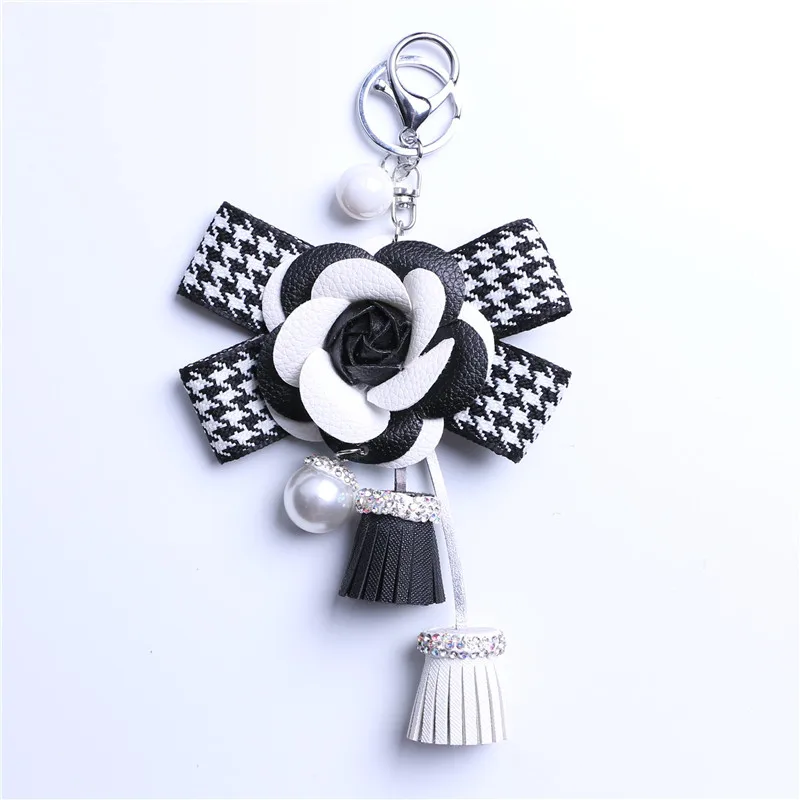 Leather Camellia Keychain Metal Key Ring Long Rhinestone Tassel Car Key Chains Women Holder Handbag Charm Pendant Pearl Jewelry
Leather Camellia Keychain Metal Key Ring Long Rhinestone Tassel Car Key Chains Women Holder Handbag Charm Pendant Pearl Jewelry