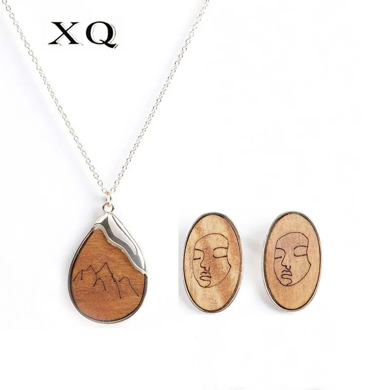 XQ Women Fashion Jewelry Wood Carving Head Mountain Tree Pattern Necklace Ear Hook Jewelry Set Accessories Wholesale Earrings
XQ Women Fashion Jewelry Wood Carving Head Mountain Tree Pattern Necklace Ear Hook Jewelry Set Accessories Wholesale Earrings