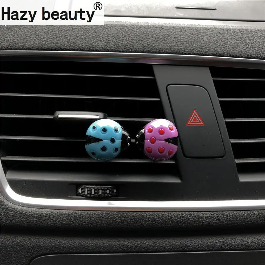 Hazy beauty new five petal flower beetle car perfume Interior decoration of air conditioner for ladybird beetle
Hazy beauty new five petal flower beetle car perfume Interior decoration of air conditioner for ladybird beetle
