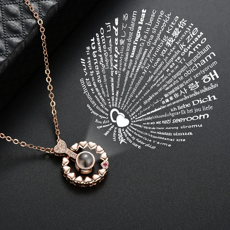 Fashion full of love crystal pendant necklace vibrato hundred kinds of I love you language projection necklace hot sale
Fashion full of love crystal pendant necklace vibrato hundred kinds of I love you language projection necklace hot sale