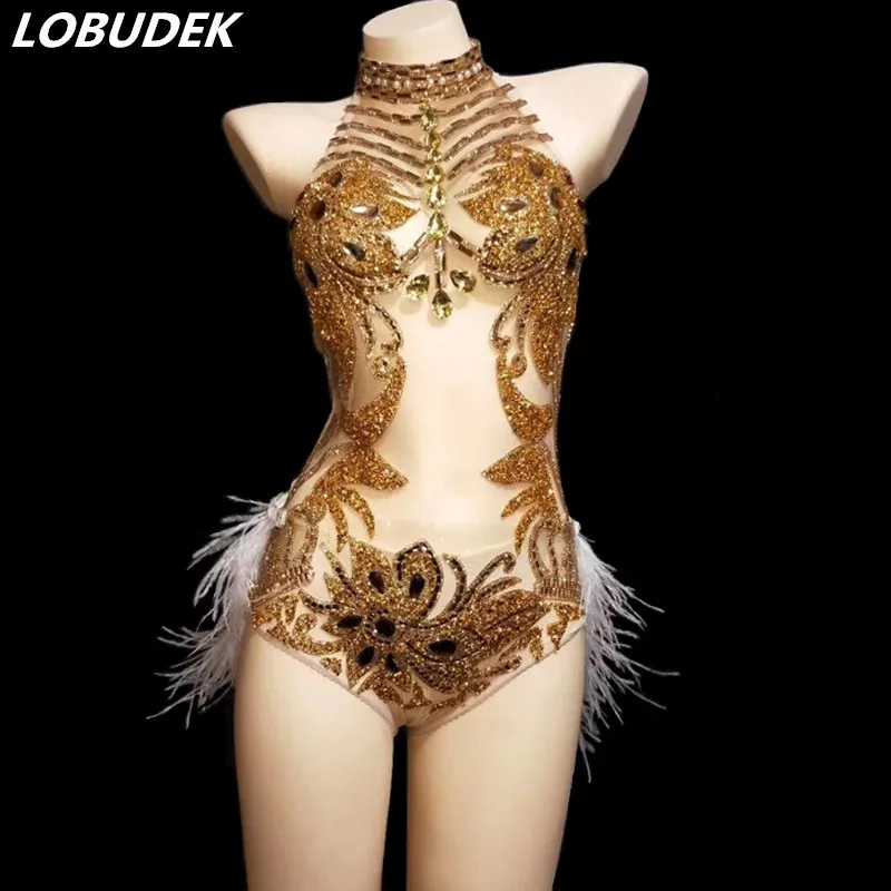 Sexy Backless Gold Rhinestones Feathers Bodysuit Sleeveless See-through Halter Catsuits Nightclub DJ Lady Team Dance Costume
Sexy Backless Gold Rhinestones Feathers Bodysuit Sleeveless See-through Halter Catsuits Nightclub DJ Lady Team Dance Costume