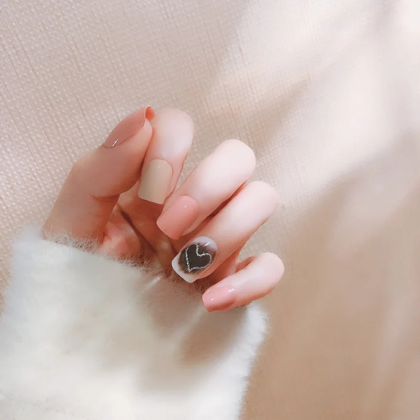 24Pcs Simple Fake Nails Cute Pink with Heart Decor Solid Long Round Artificial Nail Tips with Glue Sticker for Office Home Party
24Pcs Simple Fake Nails Cute Pink with Heart Decor Solid Long Round Artificial Nail Tips with Glue Sticker for Office Home Party