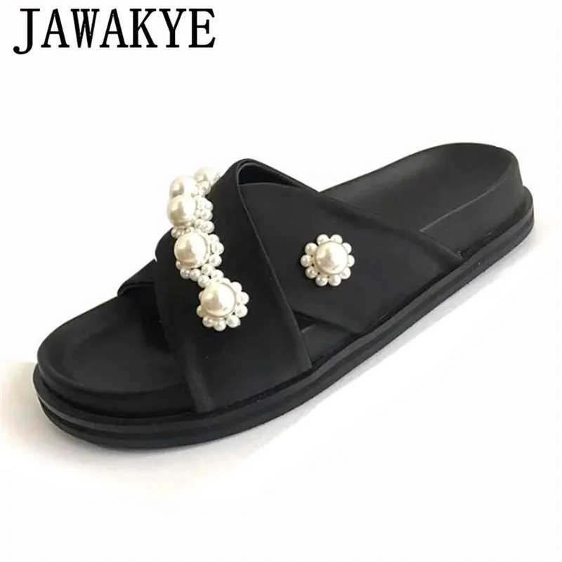 JAWAKYE Pearled Flat Beach Slippers Women Crossover Band Peep Toe Black Sandals Runway Thick Bottom String Bead Flip Flops Woman
JAWAKYE Pearled Flat Beach Slippers Women Crossover Band Peep Toe Black Sandals Runway Thick Bottom String Bead Flip Flops Woman