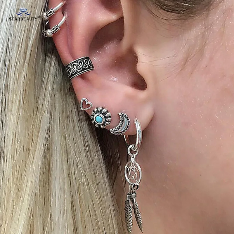 Starbeauty 7pcs/lot Dream Catcher Moon Sun Crystal Earrings Set Cuff Ear Piercing Helix Piercing Fake Nose Ring Body Jewelry
Starbeauty 7pcs/lot Dream Catcher Moon Sun Crystal Earrings Set Cuff Ear Piercing Helix Piercing Fake Nose Ring Body Jewelry