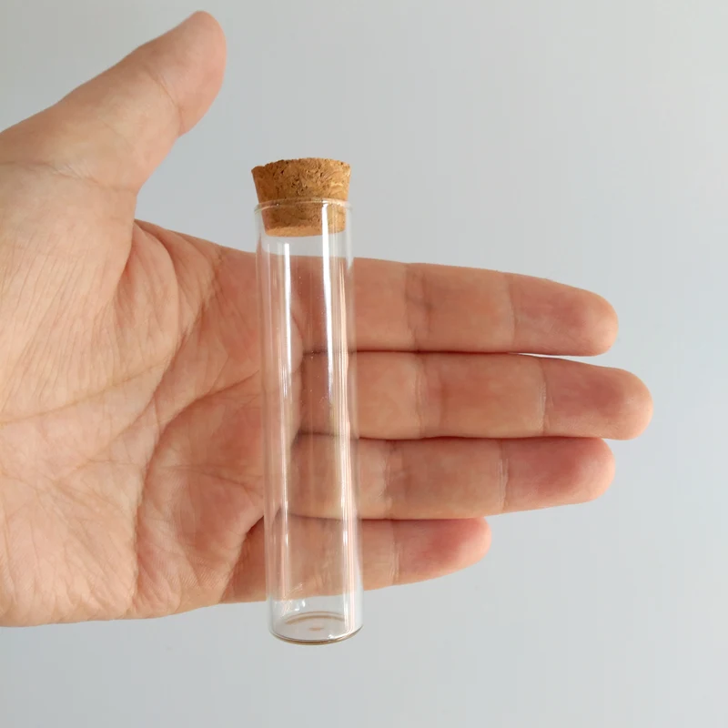 50pcs/lot 13ml bottles clear glass vials with cork 18*80mm School laboratory glass test tube Decorative crafts glass bottle
50pcs/lot 13ml bottles clear glass vials with cork 18*80mm School laboratory glass test tube Decorative crafts glass bottle