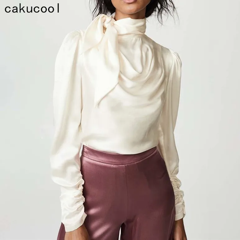 Cakucool New Women Spring Satin Blouse Top Bow Tie Neck Slim Blusas Vintage Sweet Stylish Solid Apricot Blouses Shirt Female
Cakucool New Women Spring Satin Blouse Top Bow Tie Neck Slim Blusas Vintage Sweet Stylish Solid Apricot Blouses Shirt Female