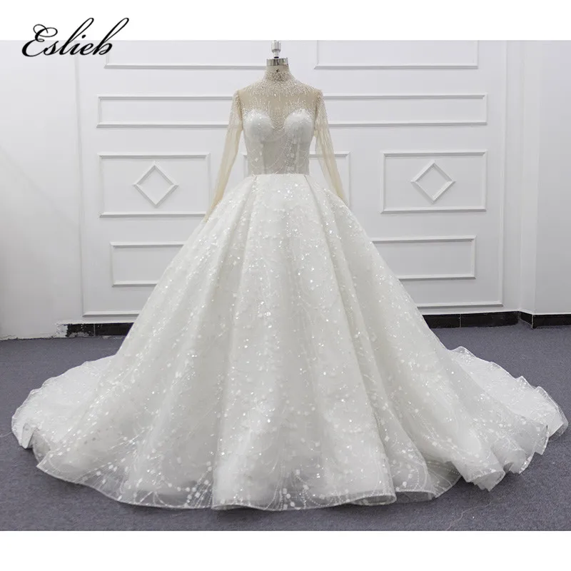 Eslieb 2019 new real photo through back in zhongshan long train crystal beads ivory wedding dress ball gown SJ074 Hochzeitskleid
Eslieb 2019 new real photo through back in zhongshan long train crystal beads ivory wedding dress ball gown SJ074 Hochzeitskleid