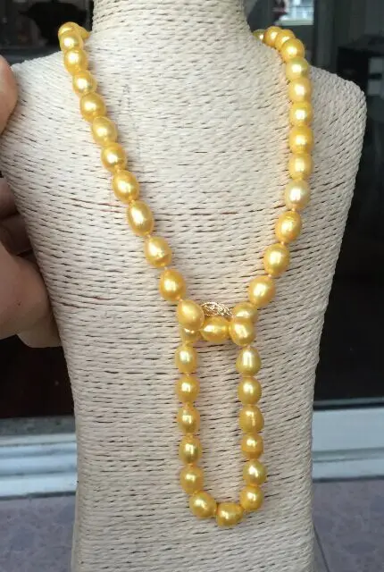 a set of 12-13mm south sea gold pearl necklace 18inch &bracelet 7.5-8inch 925silver
a set of 12-13mm south sea gold pearl necklace 18inch &bracelet 7.5-8inch 925silver