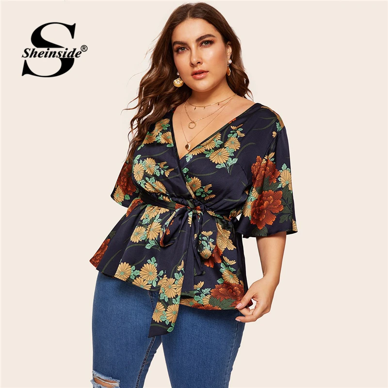 Sheinside Navy Plus Size Tops Women Deep V Neck Knot Waist Wrap Summer Blouse 2019 Half Sleeve Boho Top Female Floral Blouses
Sheinside Navy Plus Size Tops Women Deep V Neck Knot Waist Wrap Summer Blouse 2019 Half Sleeve Boho Top Female Floral Blouses