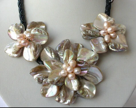 stunning baroque freshwater cultured pearl shell flower leather necklace AAA style Fine Noble real Natural (C0309)
stunning baroque freshwater cultured pearl shell flower leather necklace AAA style Fine Noble real Natural (C0309)