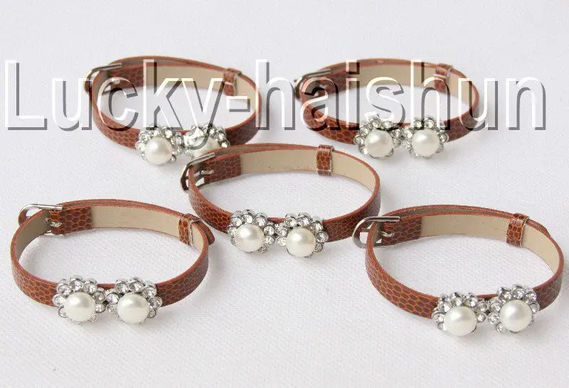Wholesale price 16new ^^^^^^^5piece adjustable khaki leather round white pearls bracelet
Wholesale price 16new ^^^^^^^5piece adjustable khaki leather round white pearls bracelet