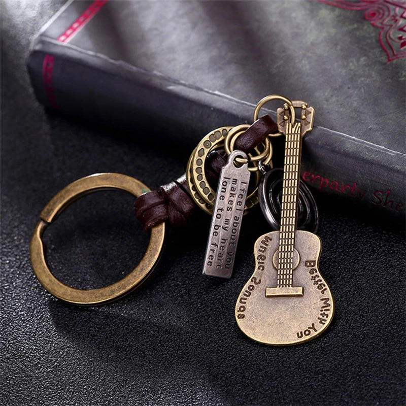 Alloy Vintage Guitar Key Rings Musical Instrument Braided Cowhide Keychain Pendant Gift For Friends 1PCS
Alloy Vintage Guitar Key Rings Musical Instrument Braided Cowhide Keychain Pendant Gift For Friends 1PCS