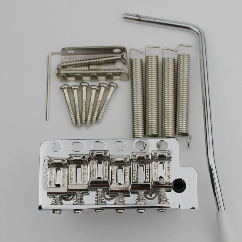 Korea ST guitar Wilkinson WV6 tremolo bridge Bent Steel Saddles+ Zinc Block Or brass Block Chrome From Korea
Korea ST guitar Wilkinson WV6 tremolo bridge Bent Steel Saddles+ Zinc Block Or brass Block Chrome From Korea