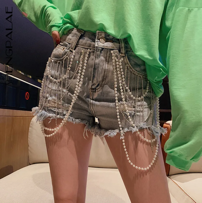 SHENGPALAE 2019 High Waist Holes Korean Personality Summer Spring Split Joint Pearl And Tassels Denim Shorts Woman Tide FR403
SHENGPALAE 2019 High Waist Holes Korean Personality Summer Spring Split Joint Pearl And Tassels Denim Shorts Woman Tide FR403