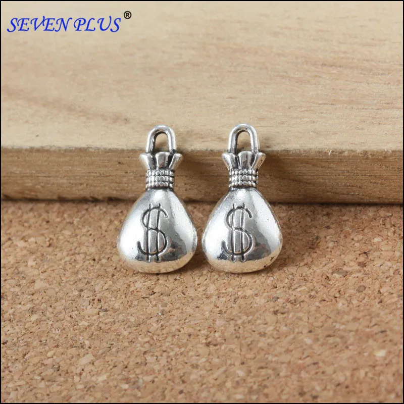 High Quality 20 Pieces/Lot 17mm*10mm Antique Silver Plated Small Metal Charm 3D Dollar Bag Money Charms For Jewelry
High Quality 20 Pieces/Lot 17mm*10mm Antique Silver Plated Small Metal Charm 3D Dollar Bag Money Charms For Jewelry