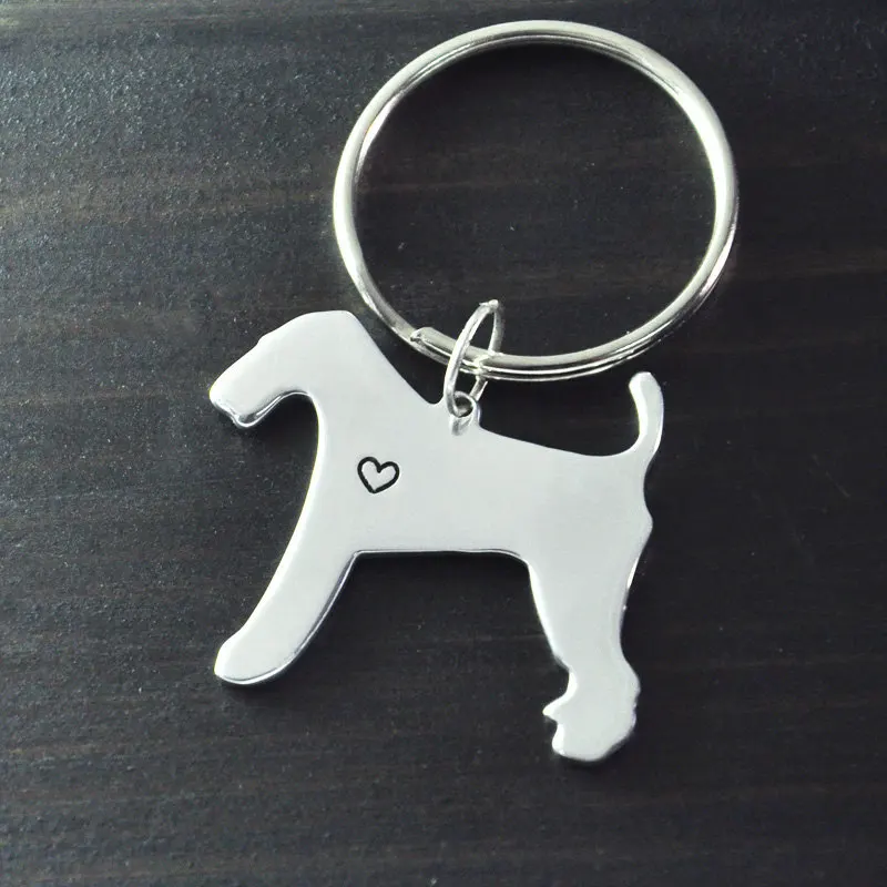 Airedale Terrier keychain dog key chain alloy hand cut Airedale Terrier pendant beautiful charm
Airedale Terrier keychain dog key chain alloy hand cut Airedale Terrier pendant beautiful charm