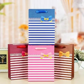 New style Kraft Paper Gift Bag With Handle 18*8*24cm Wedding Party Gift Birthday/Valentine's Day gift bag for garment
New style Kraft Paper Gift Bag With Handle 18*8*24cm Wedding Party Gift Birthday/Valentine's Day gift bag for garment