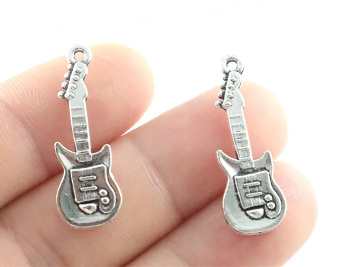 31x11mm 20pcs Antique Silver Plated Guitar Handmade Charms Pendant:DIY for bracelet necklace-Q5-01
31x11mm 20pcs Antique Silver Plated Guitar Handmade Charms Pendant:DIY for bracelet necklace-Q5-01