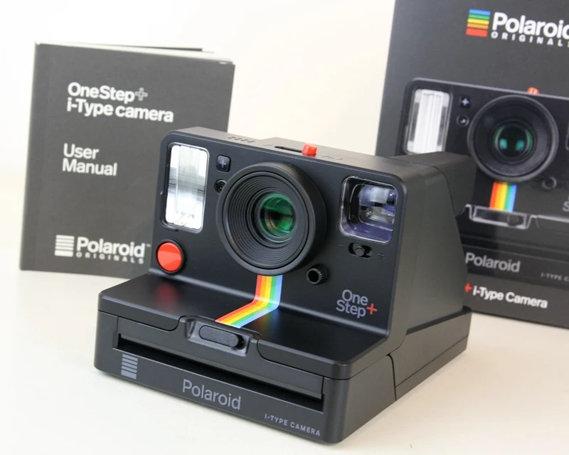 Polaroid Originals Onestep+ White and Black rainbow camera with i-type 600 film and Bluetooth is connected to the phone.
Polaroid Originals Onestep+ White and Black rainbow camera with i-type 600 film and Bluetooth is connected to the phone.