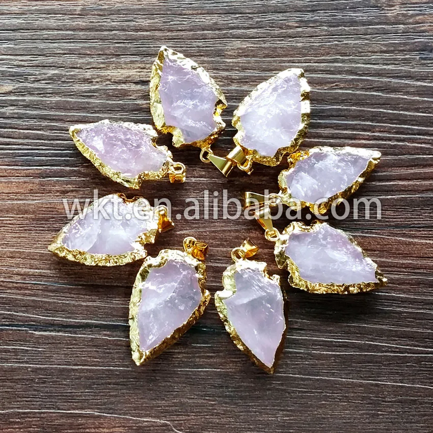 WT-P477 WKT Wholesale Hand carved rose stone crystal crystal stone arrowhead pendants with 24k gold trim
WT-P477 WKT Wholesale Hand carved rose stone crystal crystal stone arrowhead pendants with 24k gold trim