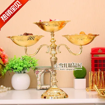 The new European fashion creative golden three feet high luxury hotel KTV wedding essential Home Furnishing compote
The new European fashion creative golden three feet high luxury hotel KTV wedding essential Home Furnishing compote