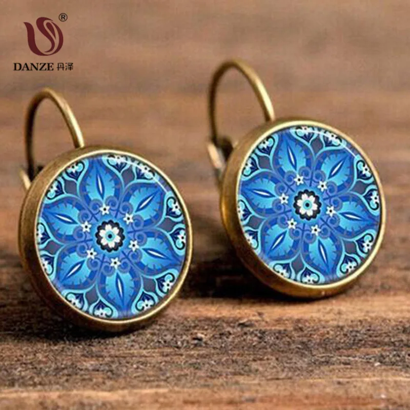 DANZE Blue Kaleidoscope Hanging Earrings Mandala Flower Glass Cabochon Ear Pendant Fashion Wholesale Brincos Jewelry
DANZE Blue Kaleidoscope Hanging Earrings Mandala Flower Glass Cabochon Ear Pendant Fashion Wholesale Brincos Jewelry