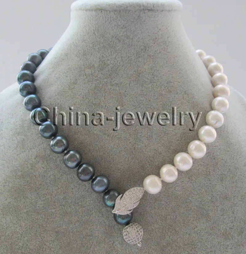 Wholesale price 16new ^^^^18" 11-12mm natural white & black round freshwater pearl necklace 
Wholesale price 16new ^^^^18" 11-12mm natural white & black round freshwater pearl necklace