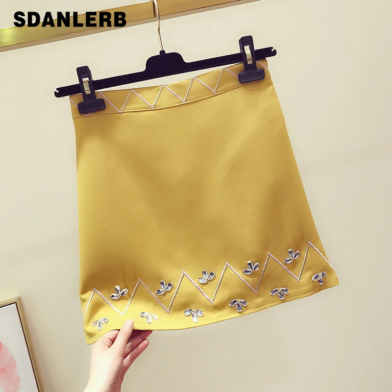 2019 Spring Summer New Women High Waist Short Skirt Fashion Embroidery Beades Mini Skirt Female Slim Office Lady Skirts Students
2019 Spring Summer New Women High Waist Short Skirt Fashion Embroidery Beades Mini Skirt Female Slim Office Lady Skirts Students