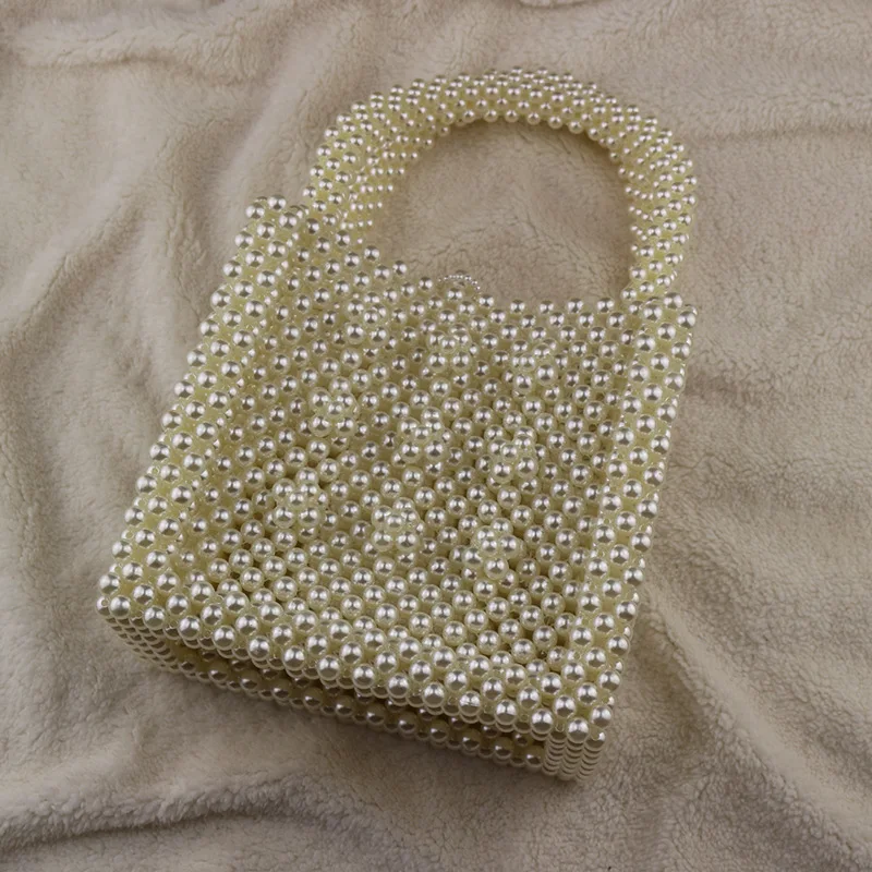 New Beaded Handbags Europe and The United States Fashion Boutique Hand-woven Portable Evening Bag Retro Ethnic White Bag
New Beaded Handbags Europe and The United States Fashion Boutique Hand-woven Portable Evening Bag Retro Ethnic White Bag