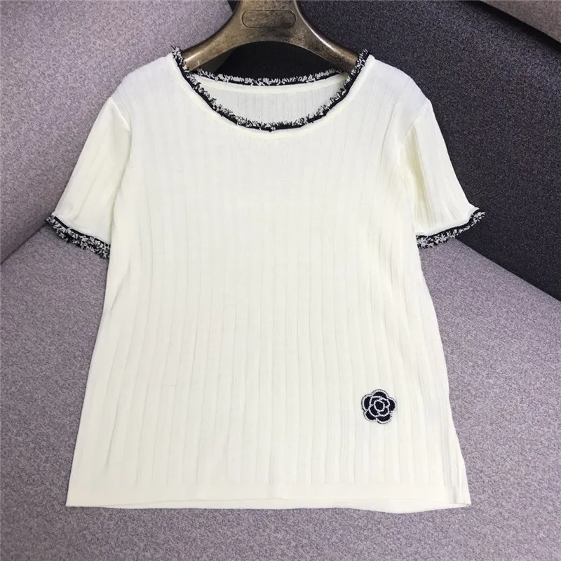 Luxury Designer Brand Knitted Top for Women O Neck Camellia Beading Tassel Ice Silk Knitted T Shirts White Black
Luxury Designer Brand Knitted Top for Women O Neck Camellia Beading Tassel Ice Silk Knitted T Shirts White Black