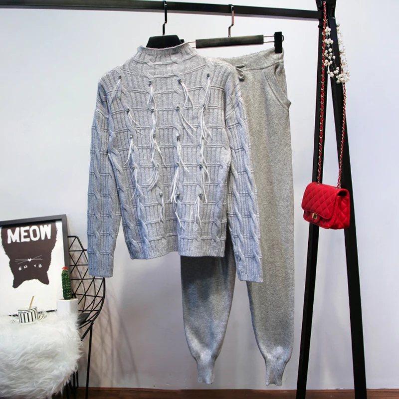 Tracksuits 2018 Spring Cotton Full Sequined New Arrival Knit Suit Women Fashion Beaded Feather Sweater + Trousers Two-piece Set
Tracksuits 2018 Spring Cotton Full Sequined New Arrival Knit Suit Women Fashion Beaded Feather Sweater + Trousers Two-piece Set