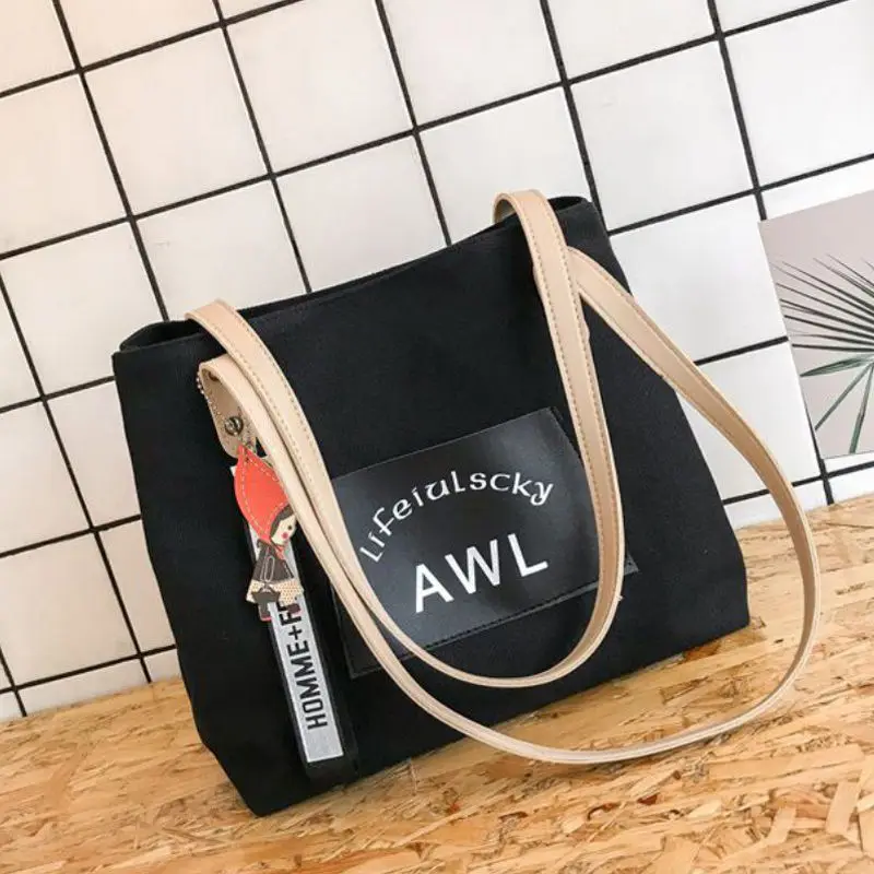 Chic Letter Print Canvas Button Lock Messenger Bag Women Simple Versatile Simple Large Capacity Retro Shoulder Bag bolso mujer
Chic Letter Print Canvas Button Lock Messenger Bag Women Simple Versatile Simple Large Capacity Retro Shoulder Bag bolso mujer
