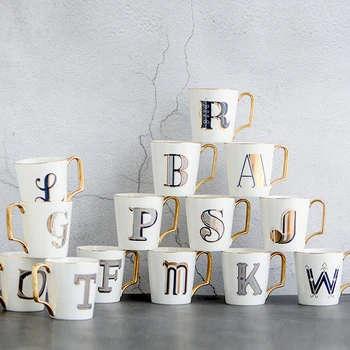 1pc European Gold letters ceramic cup lovers breakfast coffee cup milk tea A-Z letter Men women Creative Mug
1pc European Gold letters ceramic cup lovers breakfast coffee cup milk tea A-Z letter Men women Creative Mug